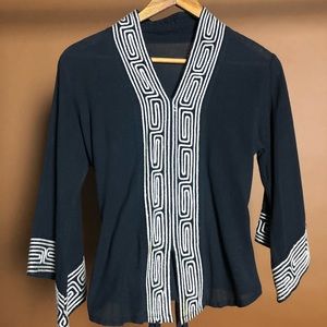 Vintage blouse with geometric embroidered details